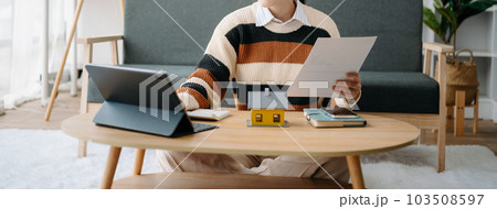 Real estate broker agent presenting and consult to customer to decision making sign insurance form agreement, home model, concerning mortgage loan offer in office Real estate broker agent presenting and consult to customer to decision making sign insurance form agreement, home model, concerning mortgage loan offer in office 103508597