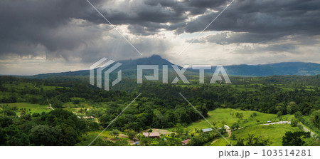 Amazing view of beautiful Arenal volcano in Costa Rica. Panorama of volcano Arenal reflected on wonderful picturesque lake, La Fortuna, Costa Rica. Central America. Amazing view of beautiful Arenal volcano in Costa Rica. Panorama of volcano Arenal reflected on wonderful picturesque lake, La Fortuna, Costa Rica. Central America. 103514281