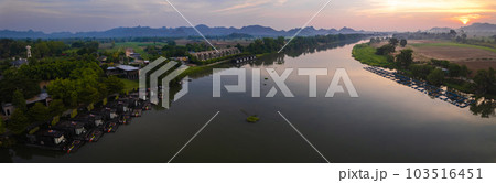 Aerial view of River Kwai and floating houses in Kanchanaburi province, Thailand Aerial view of River Kwai and floating houses in Kanchanaburi province, Thailand 103516451