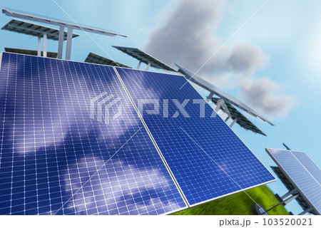 Rows of solar panels on a green meadow Rows of solar panels on a green meadow 103520021