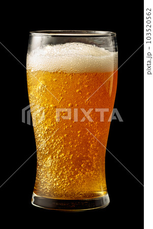 Glass of beer isolated on a black background. Glass of beer isolated on a black background. 103520562