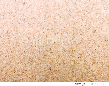 細かい木片を圧縮した明るい薄茶色のパーティクルボードの表面の背景画像 細かい木片を圧縮した明るい薄茶色のパーティクルボードの表面の背景画像 103529679