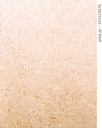 細かい木片を圧縮した白木色のパーティクルボードの表面の縦長の背景画像 103529876
