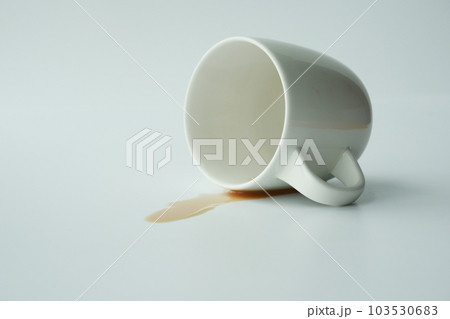 cup of coffee spilled on white background  103530683