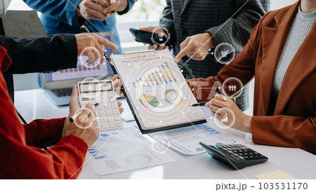 Working team meeting concept, business using laptop and smart phone and digital tablet computer with digital marketing media in virtual icon network diagram office Working team meeting concept, business using laptop and smart phone and digital tablet computer with digital marketing media in virtual icon network diagram office 103531170