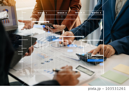 Project manager working and update tasks with milestones progress planning and Gantt chart scheduling diagram.business tram working at office 103531261