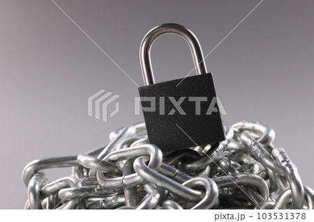 Control lock and chain on gray background concept 103531378