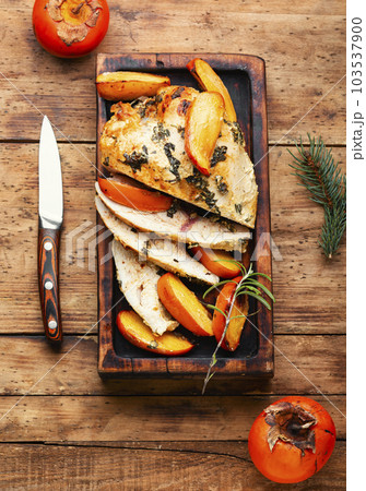 Chicken meat cooked with persimmon. Chicken meat cooked with persimmon. 103537900