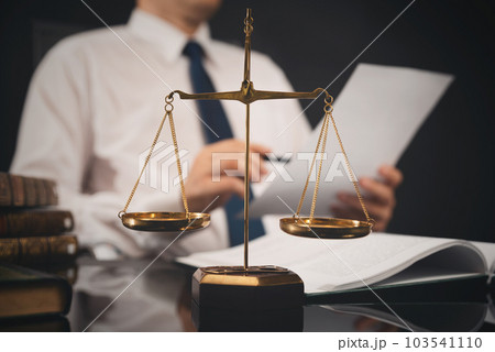 Attorney working at the office Attorney working at the office 103541110