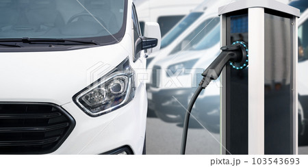 Electric delivery van with electric vehicles charging station. 103543693
