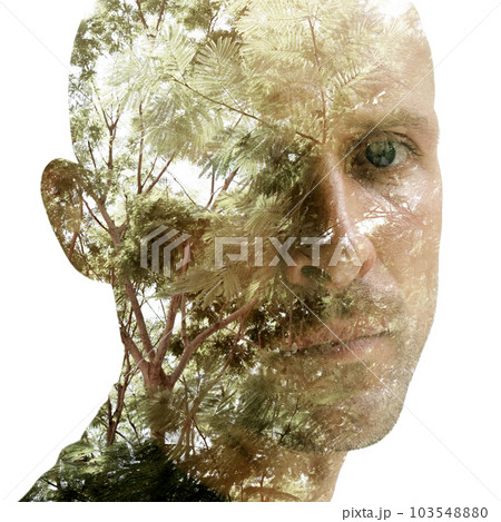 Double exposure portrait of a man looking sadly into the camera Double exposure portrait of a man looking sadly into the camera 103548880