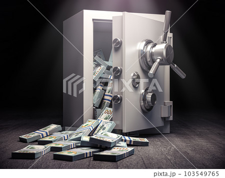 Unlocked steel safe with dollar banknote packs inside. 103549765