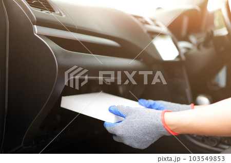 Cabin Air Filter Replacement, Air filter in the cabin that is dirty after use for a while. Automotive air conditioning, check dust and amiss in car, Car care and maintenance concept. Cabin Air Filter Replacement, Air filter in the cabin that is dirty after use for a while. Automotive air conditioning, check dust and amiss in car, Car care and maintenance concept. 103549853