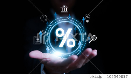 Interest rate and dividend concept. Percent icon and up arrow Showing in hands of businessman. long term investment for retirement. return on stocks and mutual funds, Interest rates to increase, Interest rate and dividend concept. Percent icon and up arrow Showing in hands of businessman. long term investment for retirement. return on stocks and mutual funds, Interest rates to increase, 103549857