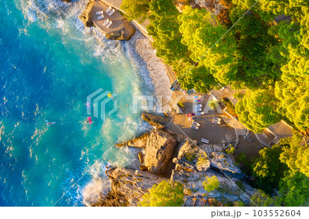 View from the air on the beach. Aerial view. Rest on the beach. Sea relaxation and travel. View from the air on the beach. Aerial view. Rest on the beach. Sea relaxation and travel. 103552604