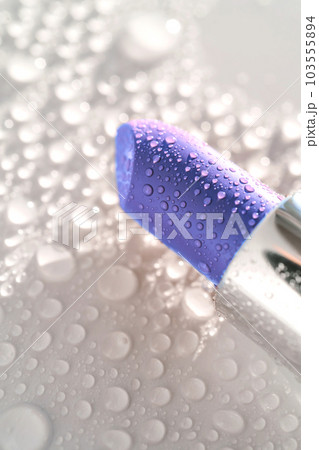 Moisturizing lipstick with water drops on it. 103555894
