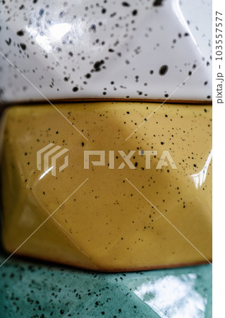 The texture of multicolored glazed enamel. Abstract background. 103557577
