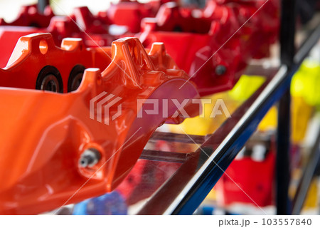 Checking car brake system for repair at car garage 103557840