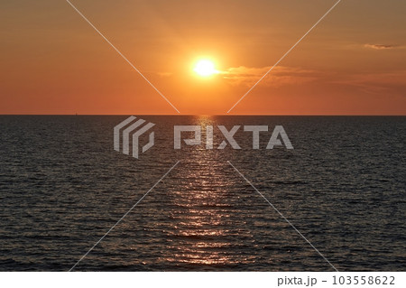 Sunset over sea 103558622