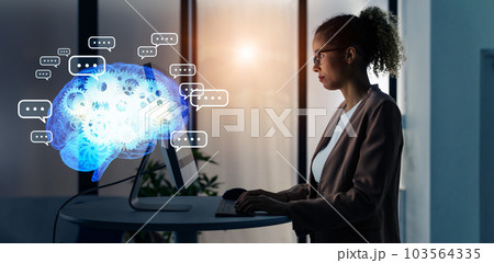 オフィスでPCを使う外国人エンジニアと対話型AIイメージ 103564335
