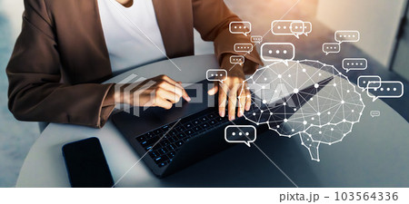 オフィスでPCを使う外国人エンジニアと対話型AIイメージ オフィスでPCを使う外国人エンジニアと対話型AIイメージ 103564336
