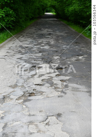 Bad and broken road. A badly repaired road in the Czech Republic. Bad and broken road. A badly repaired road in the Czech Republic. 103566344