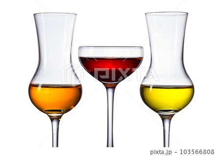 Glasses of different alcoholic drinks isolated on a white background Glasses of different alcoholic drinks isolated on a white background 103566808