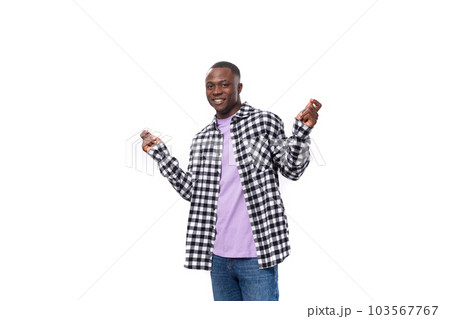 well-groomed pleasant young american guy with short hair dressed casually on a white background with 103567767