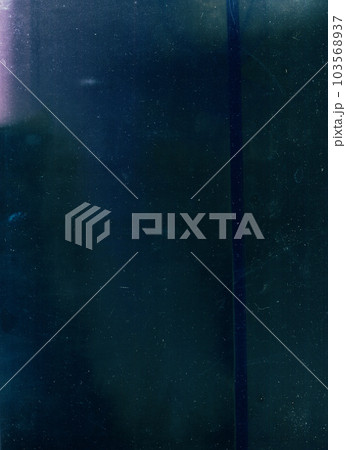 Dust scratches texture. Old film overlay. Grunge filter. Purple pink blue green color glow stains fingerprints on dark worn screen illustration abstract background. 103568937