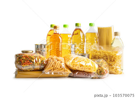 Foodstuff for donation, storage and delivery on white background with clipping path. Various food, pasta, cooking oil and canned food. 103570075