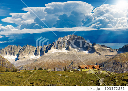 Mountain Peaks against Beautiful Storm Clouds - Trentino Italy Mountain Peaks against Beautiful Storm Clouds - Trentino Italy 103572881