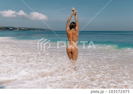 young naked on beach 