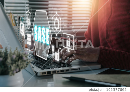 SASE, Secure Access Service Edge concept, Person using laptop with Secure Access Service Edge icon on virtual screen background, password, network, framework and support. 103577863