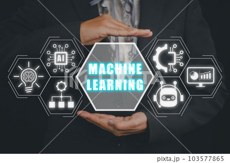 Machine learning concept, Businessman hand holding machine learning icon on virtual screen. 103577865