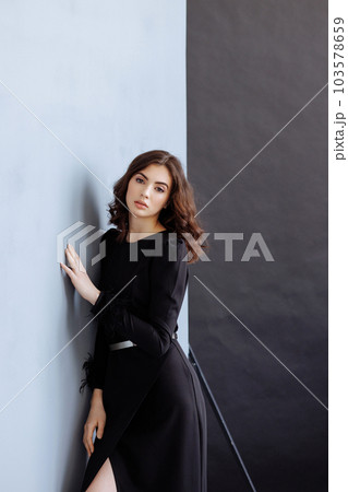 Attractive woman with long brunette hair 103578659
