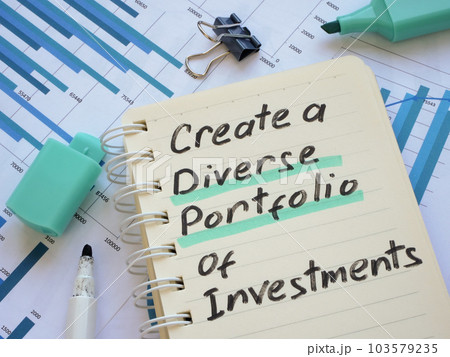 Handwritten inscription Create a diverse portfolio of investments in the notebook. Handwritten inscription Create a diverse portfolio of investments in the notebook. 103579235