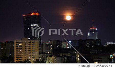Full moon over city of Szczecin, Poland. 103583574