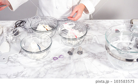 Step by step. Mixing food coloring into the meringue to bake unicorn meringue cookies. Step by step. Mixing food coloring into the meringue to bake unicorn meringue cookies. 103583575