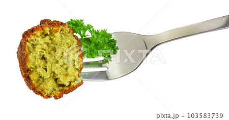 falafel ball on a fork isolated on a white background with full depth of field 103583739