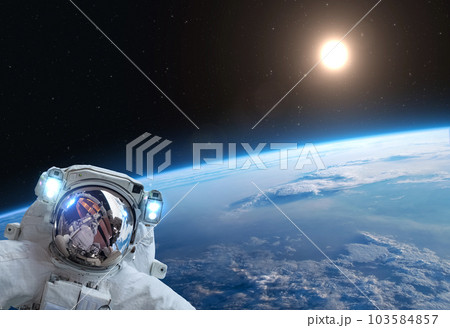 Astronaut, Earth ans Sun. Astronaut, Earth ans Sun. 103584857