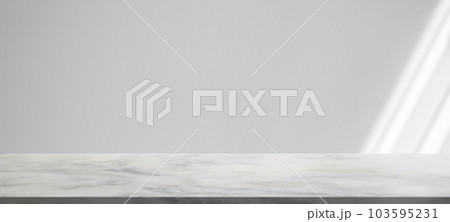 Marble table with window shadow drop on white wall background for mockup product display 103595231