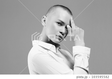 black and white portrait of beautiful bald woman black and white portrait of beautiful bald woman 103595582