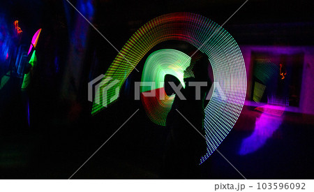 Light, art and abstract illustration against a black background for energy, glow or movement. Neon, creative and colorful pattern with long exposure for speed, vibration or texture with color splash Light, art and abstract illustration against a black background for energy, glow or movement. Neon, creative and colorful pattern with long exposure for speed, vibration or texture with color splash 103596092