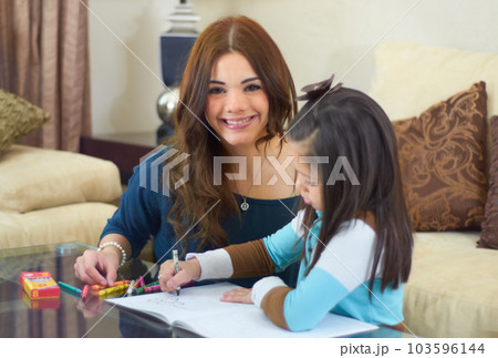 Portrait, girl and woman helping with homework and happy, tutor or au pair support for working mom. Babysitting, childcare help and kid drawing, learning or homeschool education or study with nanny 103596144