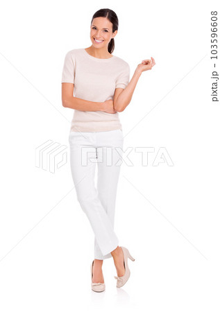 Shes everybodys woman. Studio shot of a casually dressed young woman isolated on white. Shes everybodys woman. Studio shot of a casually dressed young woman isolated on white. 103596608