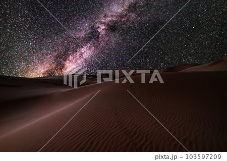 Amazing views of the Sahara desert under the night starry sky. Amazing views of the Sahara desert under the night starry sky. 103597209