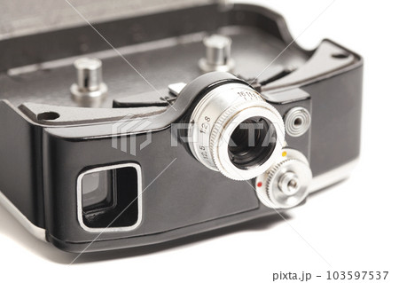 Vintage movie camera with filters isolated on white background Vintage movie camera with filters isolated on white background 103597537