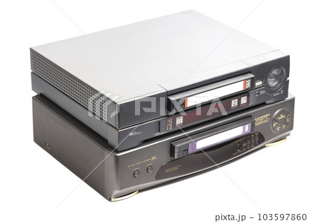 Old video cassette recorder with VHS video tape cassette isolated on white background 103597860