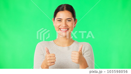 Happy woman, hands and thumbs up on green screen for agreement, good job or winning against a studio background. Portrait of female smile showing thumb emoji, yes sign or like for winning on mockup 103598056