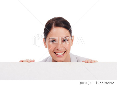 Portrait, mockup board and woman peeking over in studio isolated on a white background. Face, poster and happy female person with copy space, advertising and marketing, promotion and commercial. Portrait, mockup board and woman peeking over in studio isolated on a white background. Face, poster and happy female person with copy space, advertising and marketing, promotion and commercial. 103598442